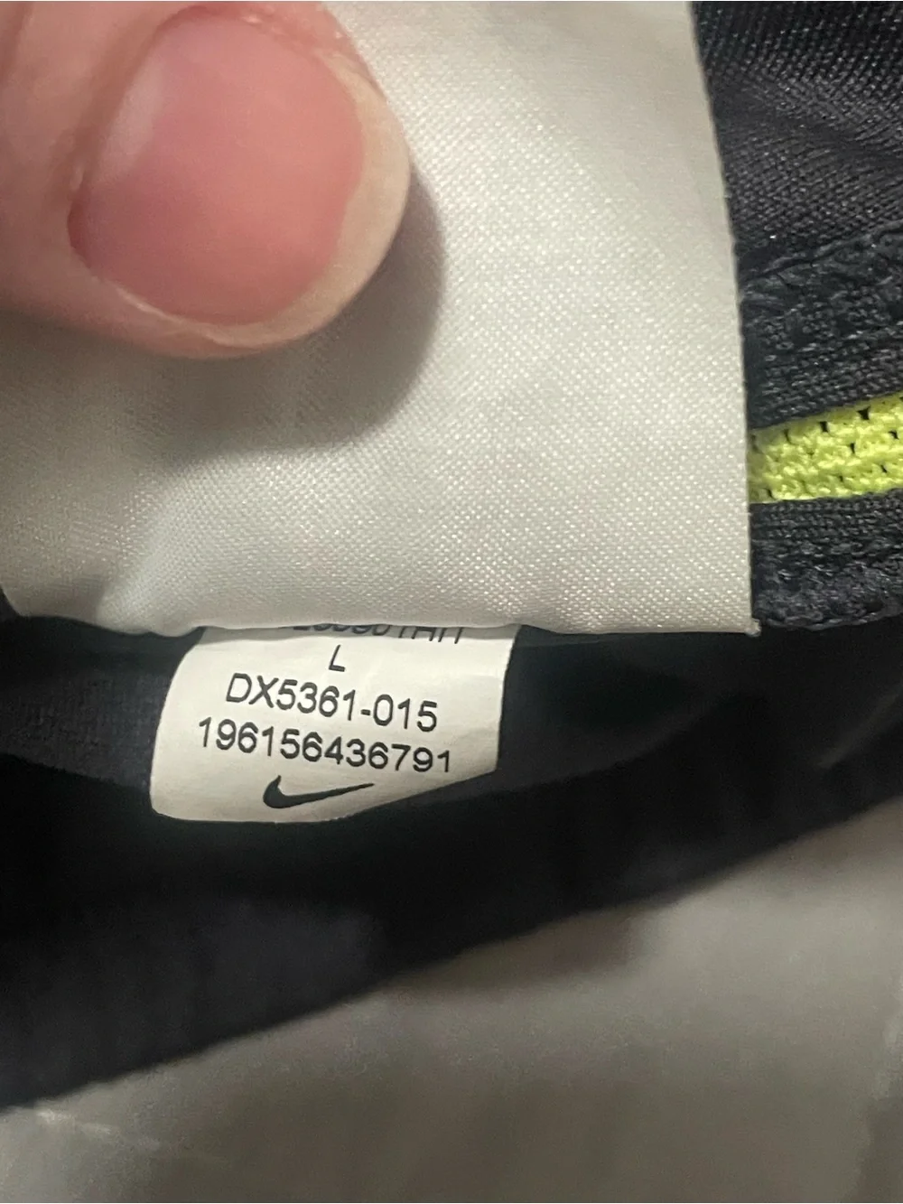 Nike Kids Black Athletic Shorts with Neon Yellow Swoosh